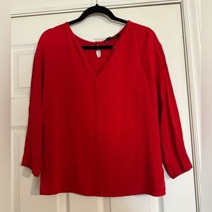 MNG Basics V-Neck blouse keyhole button back closure.